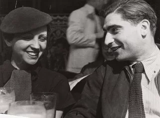 Fred Stein, Gerda Taro and Robert Capa, Cafe de Dome, Paris 1936, © Estate Fred Stein, Courtesy International Center of Photography