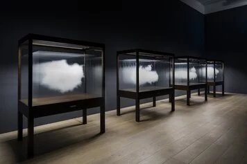 Leandro Erlich. The cloud (2012). Digital ceramic ink printed on ultra-clear glass, wooden case, and LED lights. Dimensions variable and different series