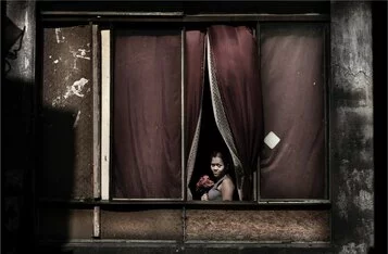 © Julio Bittencourt In a window of Prestes Maia 911 building São Paulo, Brazil 2