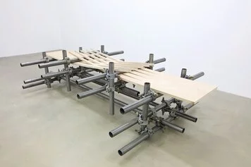 L. Lamothe, Untitled, 2014, phenolic wood boards, steel pipes, scaffolding clamps, variable dimensions