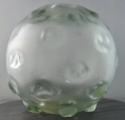 Vaso sferico in pesante vetro incolore corroso bugne, 1935 circa, Firma all’acido “Venini Murano”